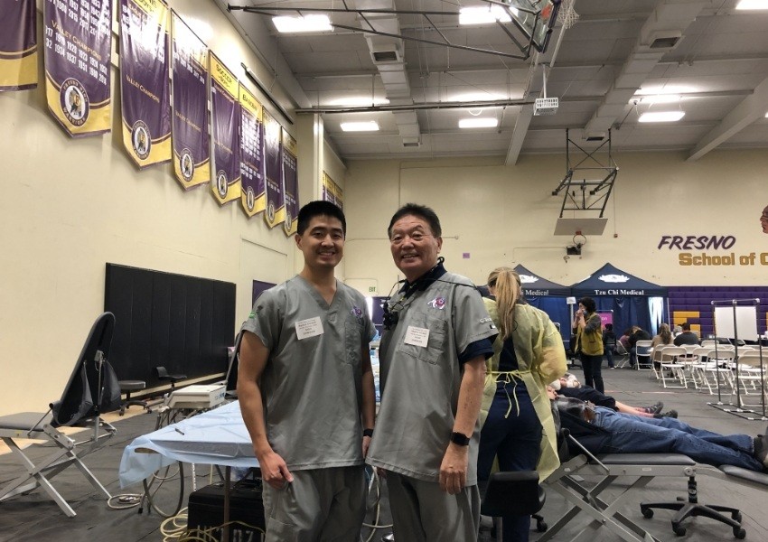 Dental team volunteering with Tzu Chi to provide dental care for those in need in our community