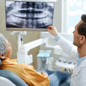 Dentist in Fresno talking to patient about dental crowns