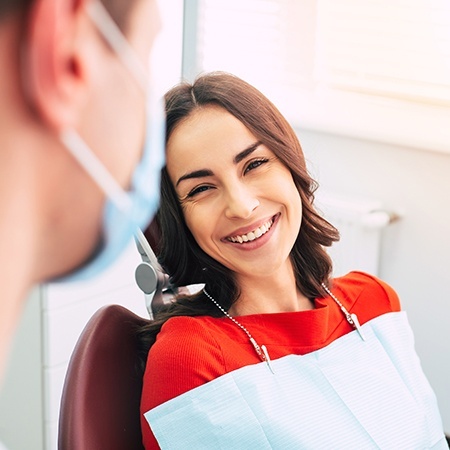 Woman smiling at dentist