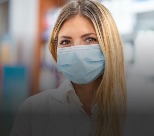 Dental team member wearing a face mask