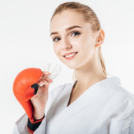 Young woman placing sportsguard