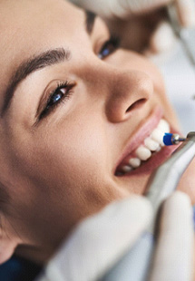 Woman having her teeth cleaned