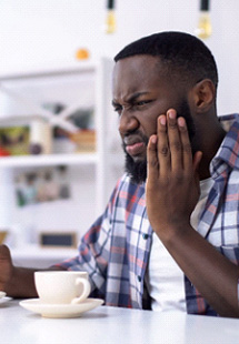 Man with tooth sensitivity
