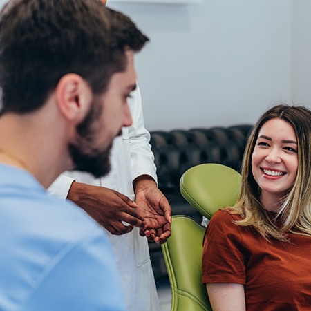 patient discussing with a dentist about dental crowns in Fresno