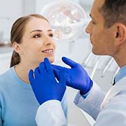 Fresno emergency dentist performing a dental exam