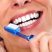 Woman brushing her teeth