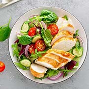 A healthy salad with chicken breast