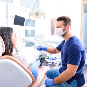 Woman at consultation for dental implants in Fresno