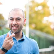 Man smiling after learning cost of Invisalign in Fresno