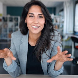 Confident businesswoman with Invisalign in Fresno