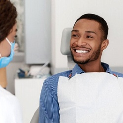 Patient attending orthodontic checkup for Invisalign in Fresno 