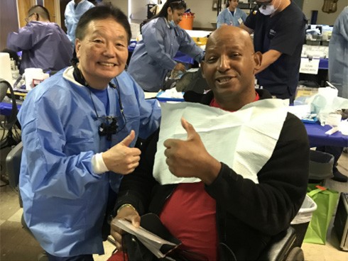 Dr. Gerald T. Shinkawa smiling with patient