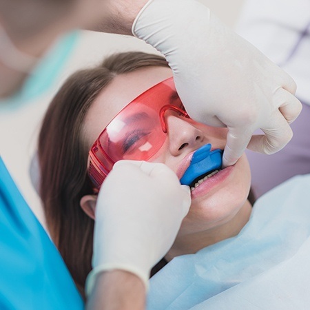 Patient receiving fluoride treatment