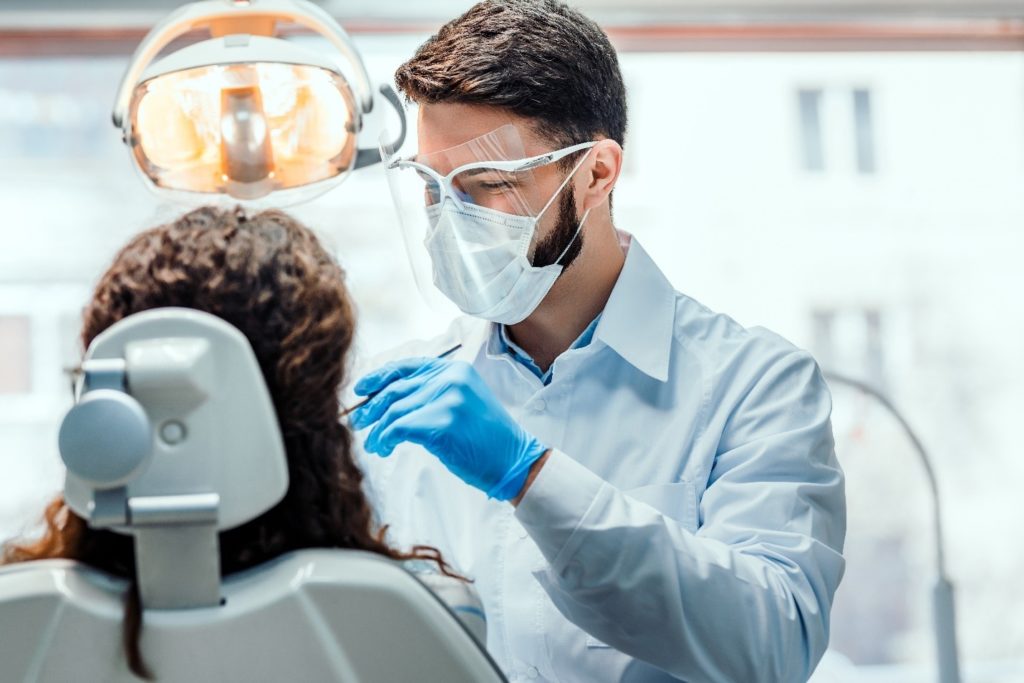 dentist treating patient