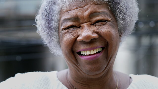 person with dentures smiling