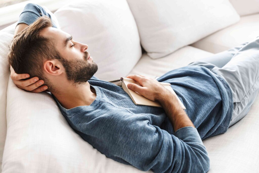 Man sleeping on a couch